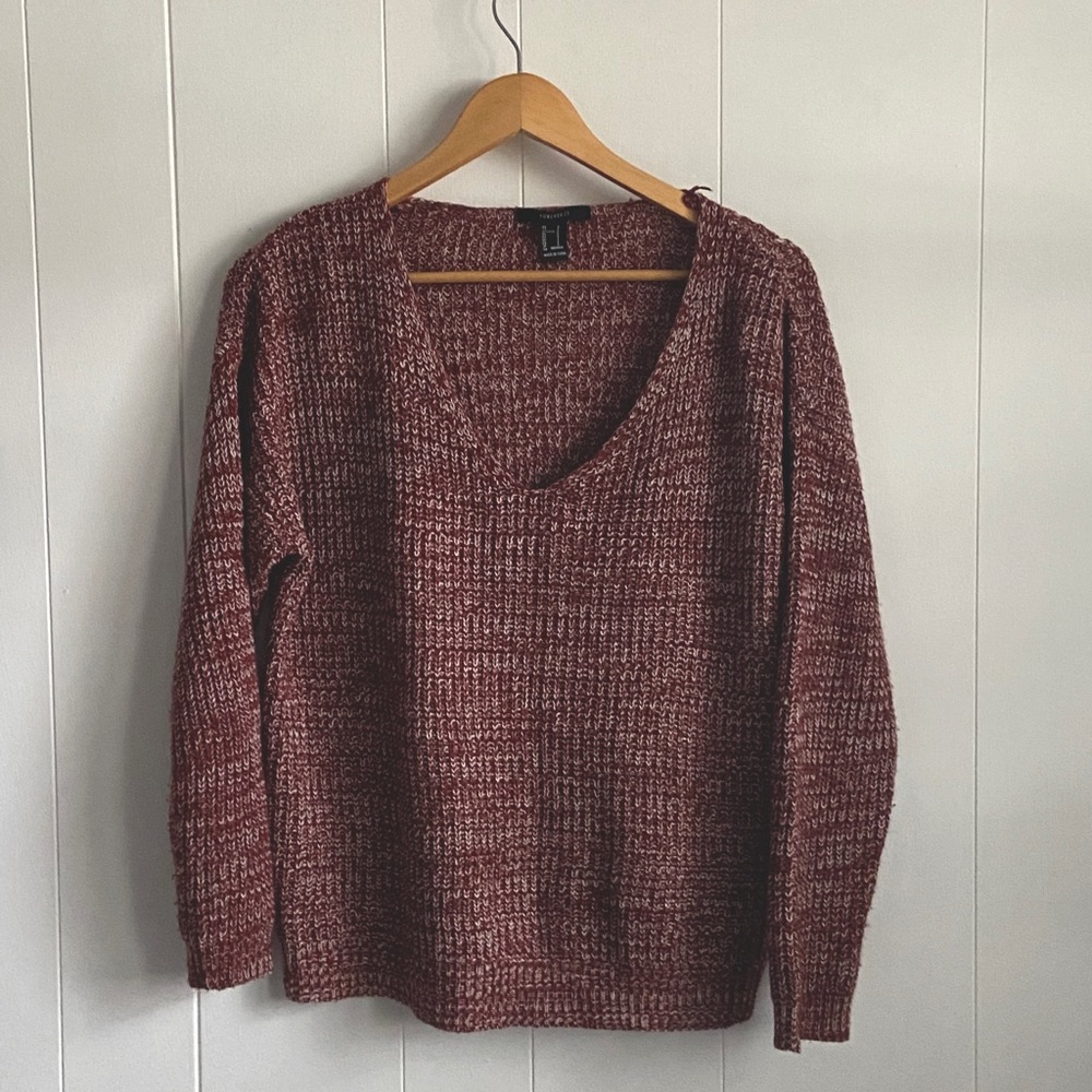 Never worn knitted sweater, fits a little bigger